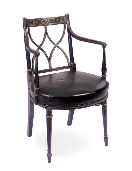 A REGENCY EBONIZED AND PARCEL-GILT OPEN ARMCHAIR,