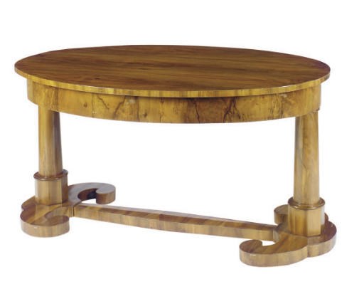 A CONTINENTAL WALNUT OVAL CENTER TABLE,