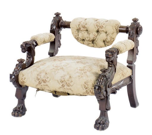 A VICTORIAN CARVED MAHOGANY LOW CHAIR,