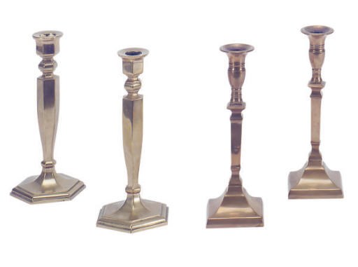 TWO PAIRS OF BELL METAL CANDLESTICKS,
