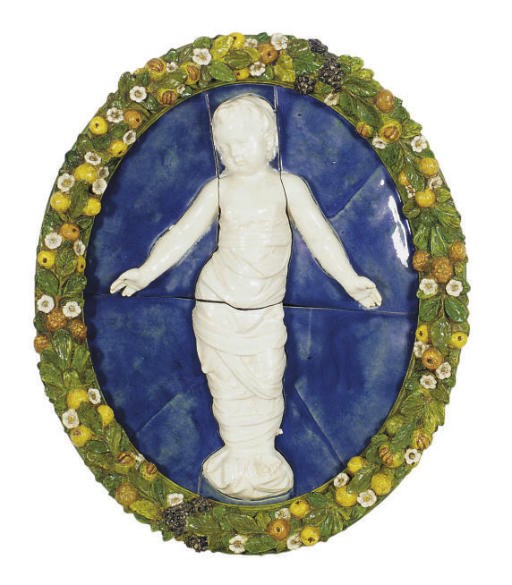 AN ITALIAN DELLA ROBBIA STYLE POLYCHROME PAINTED WOOD AND GLAZED EARTHENWARE PLAQUE,