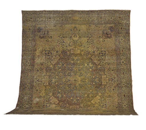 A KIRMAN CARPET,
