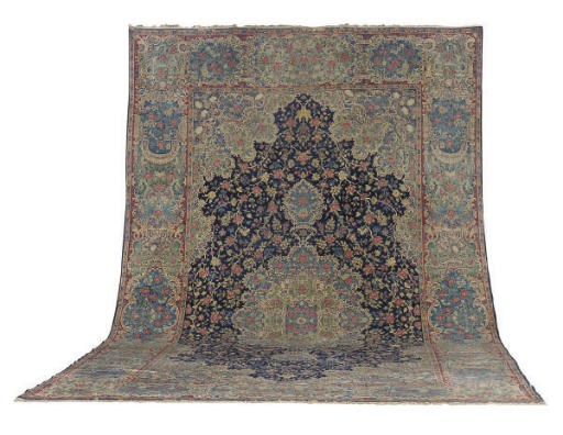 A KIRMAN CARPET,
