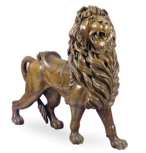 A CARVED CAROUSEL LION,