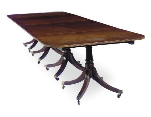AN ENGLISH MAHOGANY FOUR-PEDESTAL DINING TABLE,