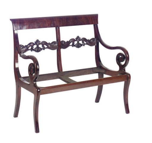 A CARVED MAHOGANY CHAIRBACK SETTEE,