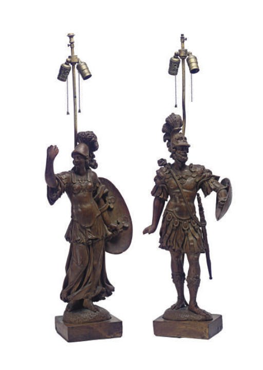 A PAIR OF CARVED LIMEWOOD SOLDIER FIGURES MOUNTED AS TABLE LAMPS,