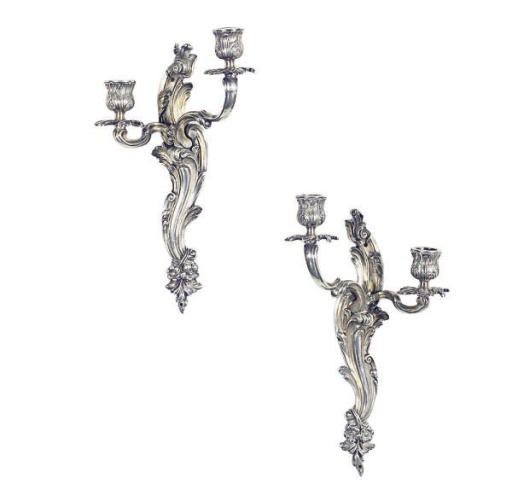 A PAIR OF SILVERED-METAL TWO-BRANCH WALL-LIGHTS,