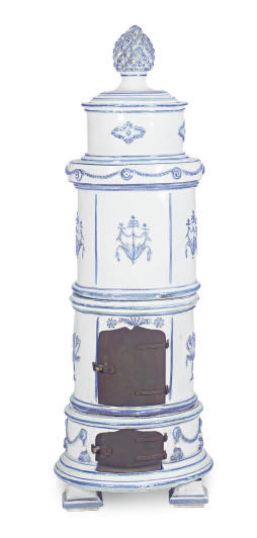 A SCANDINAVIAN EARTHENWARE CIRCULAR STOVE,