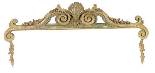 A CONTINENTAL PAINTED AND PARCEL-GILT SHELL-CARVED ARCHITECTURAL ORNAMENT,