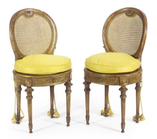 A PAIR OF CONTINENTAL BEECHWOOD AND CANED SIDE CHAIRS,