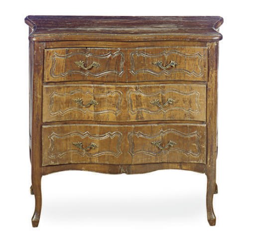 A FRENCH PROVINICAL FRUITWOOD SERPENTINE COMMODE,