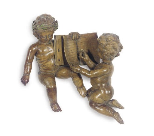 A CONTINENTAL PAINT-DECORATED FIGURAL GROUP,