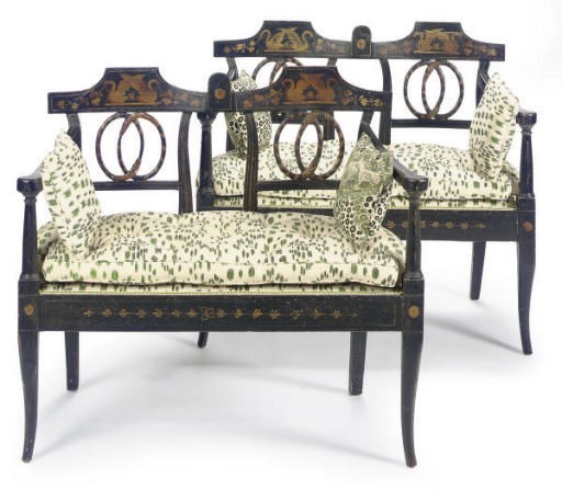 A PAIR OF CONTINENTAL EBONIZED AND PARCEL-GILT BENCHES,