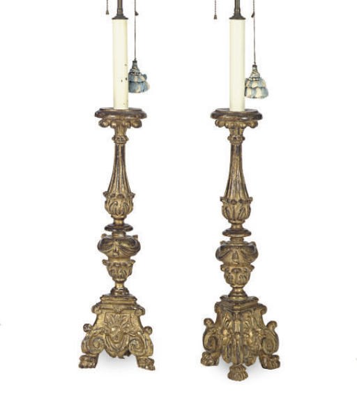 A PAIR OF ITALIAN GILTWOOD PRICKET STICKS,