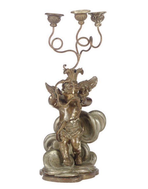 A CONTINENTAL SILVERED AND PARCEL-GILTWOOD FIGURAL THREE-LIGHT CANDELABRUM,