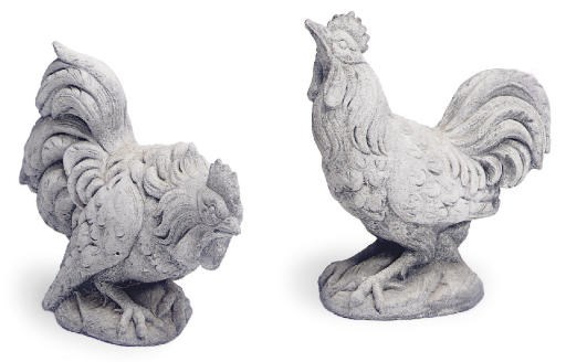A PAIR OF STONE COCKERELS,