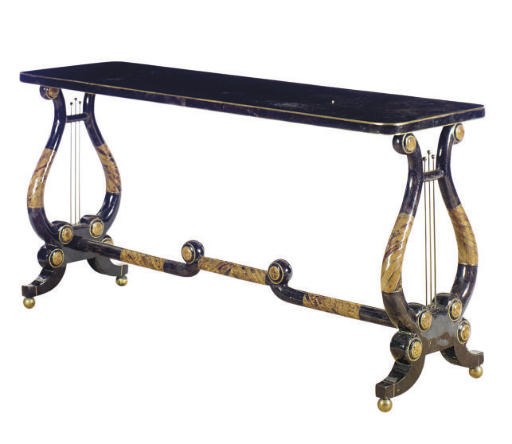 A PARCEL-GILT EBONISED LYRE-FORM CONSOLE TABLE,