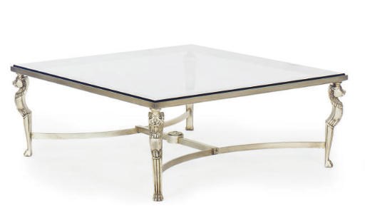 A SILVERED GLASS-TOP LOW TABLE,