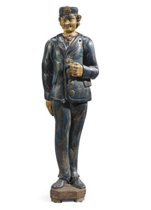 A CARVED AND PAINT-DECORATED MERCHANT CAPTAIN GENTLEMAN