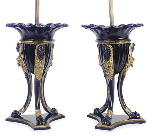 A PAIR OF EBONIZED AND PARCEL-GILT JARDINIERES MOUNTED AS LAMPS,