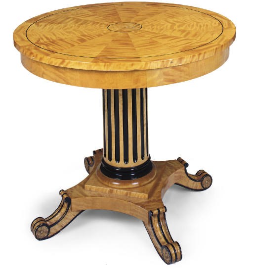A SATIN BIRCH AND EBONISED CENTRE TABLE