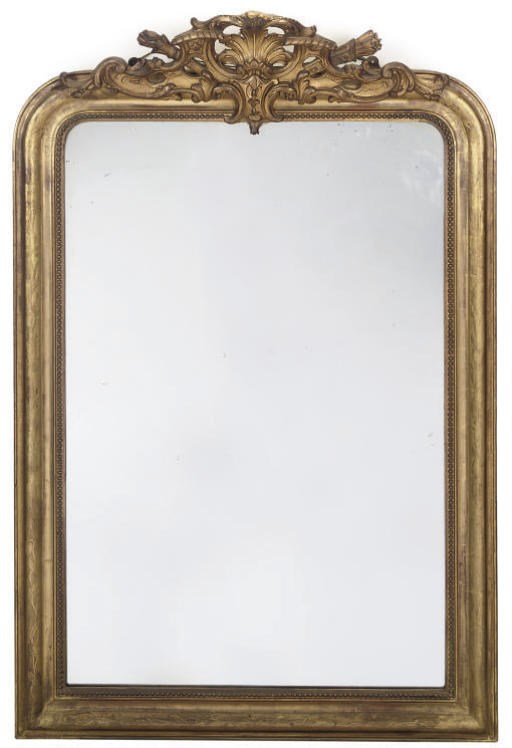 A FRENCH GILT COMPOSITION MIRROR
