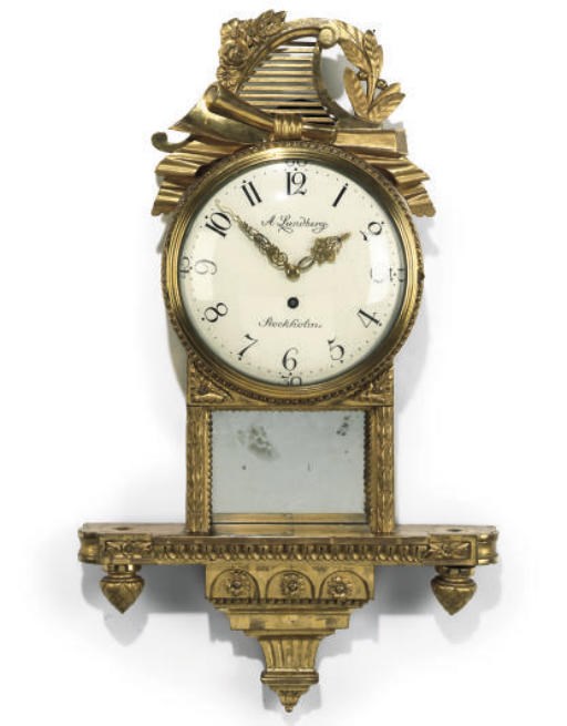 A SWEDISH GILTWOOD WALL CLOCK