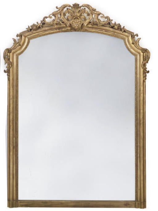 A FRENCH GILT COMPOSITION MIRROR