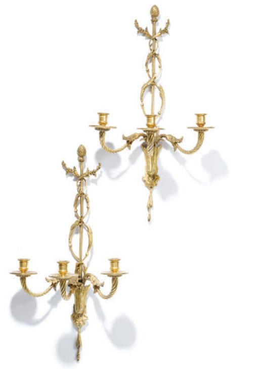 A PAIR OF GILT-METAL THREE-LIGHT WALL APPLIQUES
