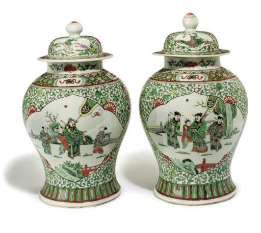 A pair of Chinese famille verte jars and covers
