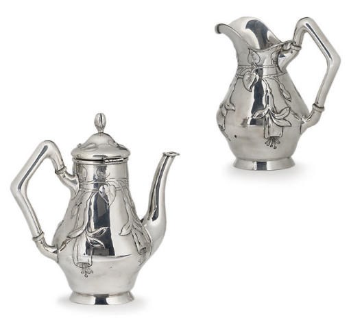 AN AUSTRIAN SILVER SMALL COFFEE POT & MILK JUG EN SUITE,