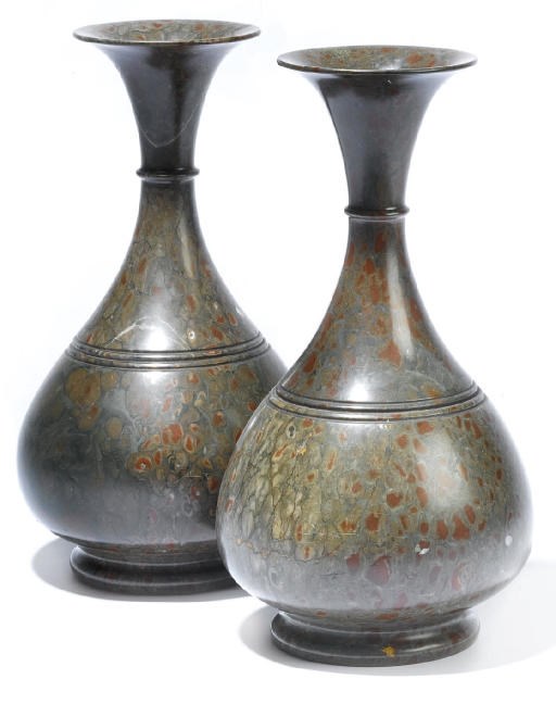A PAIR OF CONTINENTAL VARIEGATED SERPENTINE MARBLE VASES