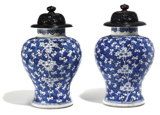A Matched pair of Chinese blue and white 'prunus' baluster jars