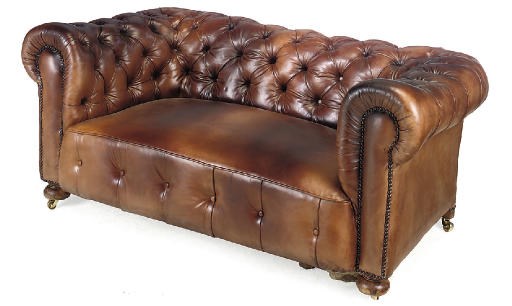 A LEATHER UPHOLSTERED CHESTERFIELD SOFA