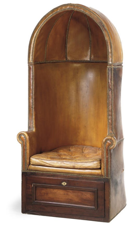 A BRASS STUDDED LEATHER UPHOLSTERED PORTERS CHAIR