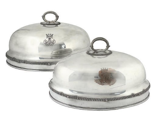A GRADUATED PAIR OF OLD SHEFFIELD PLATE MEAT DISH COVERS,