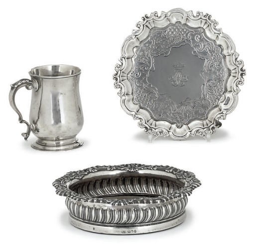 A GEORGE III SILVER WINE COASTER,