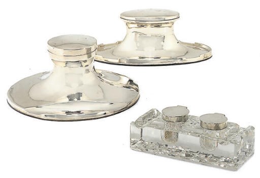 A SILVER-MOUNTED CUT-GLASS DOUBLE INKWELL,