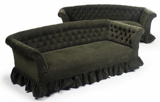 A MATCHED PAIR OF SOFAS