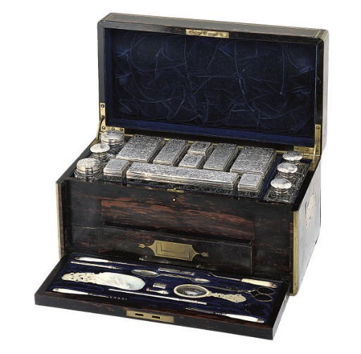 A VICTORIAN SILVER-MOUNTED CUT GLASS TRAVELLING DRESSING TABLE SET,