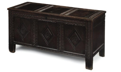 AN OAK CHEST