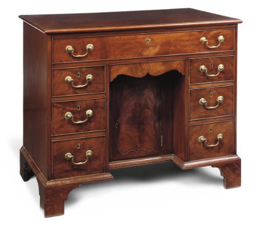 A GEORGE III MAHOGANY KNEEHOLE DRESSING TABLE