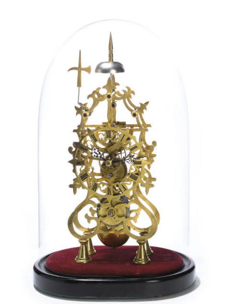 A brass eight day skeleton timepeice with passing hour strike