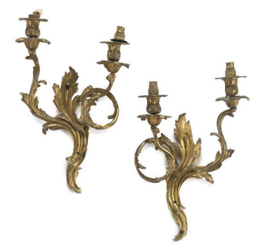 A SET OF FOUR GILT-BRONZE TWIN LIGHT WALL-APPLIQUES