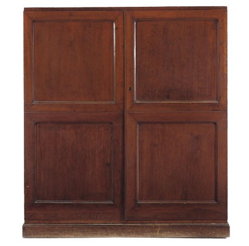 AN EARLY VICTORIAN TEAK CUPBOARD