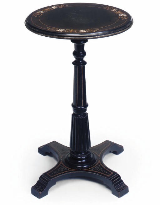 A VICTORIAN EBONISED OCCASIONAL TABLE