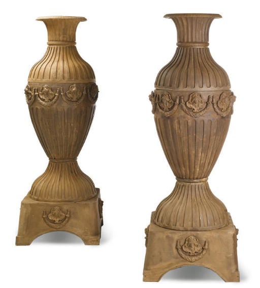 A PAIR OF SECTIONAL CAST-IRON VASES