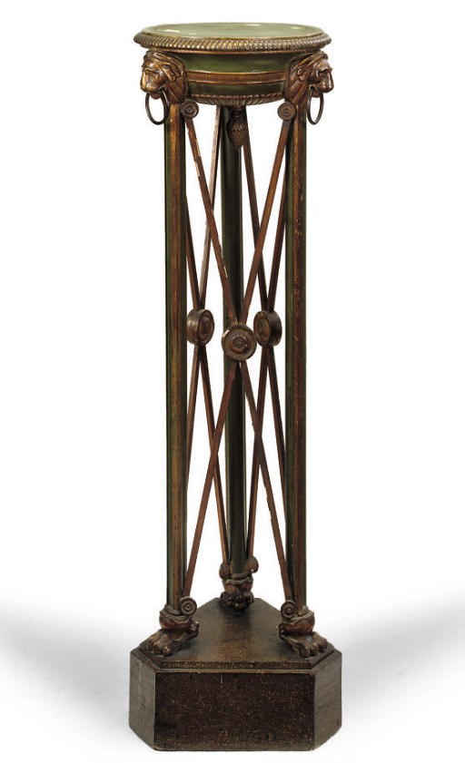 A GREEN PAINTED AND PARCEL GILT TORCHERE