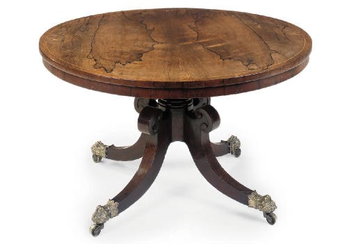 A REGENCY ROSEWOOD LOW CENTRE TABLE